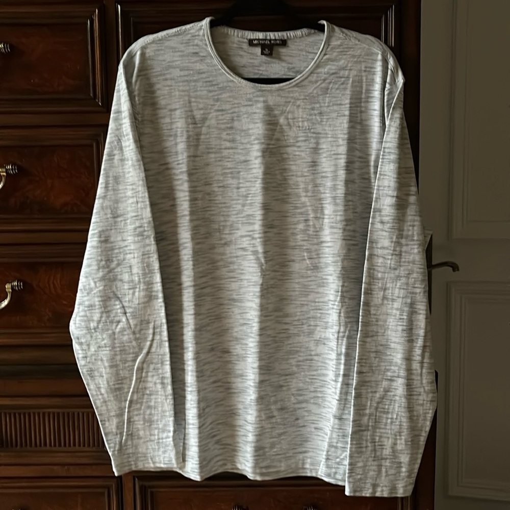 Light weight long sleeve Michael Kors casual top.  Navy lines on white material.